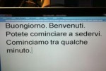 Un monitor con sottotitolazione in tempo reale di un convegno