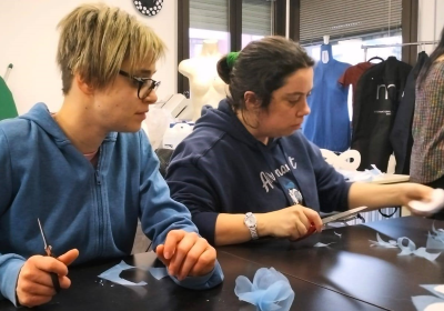 Persone della Fondazione Centro Anch'io al lavoro, in vista della sfilata di Milano