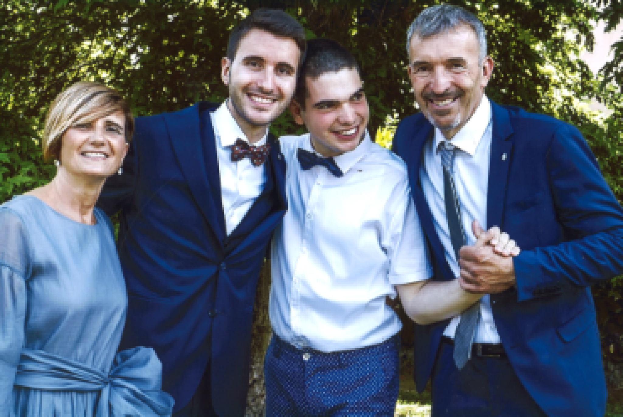 Alessandro, insieme ai genitori e al fratello Matteo