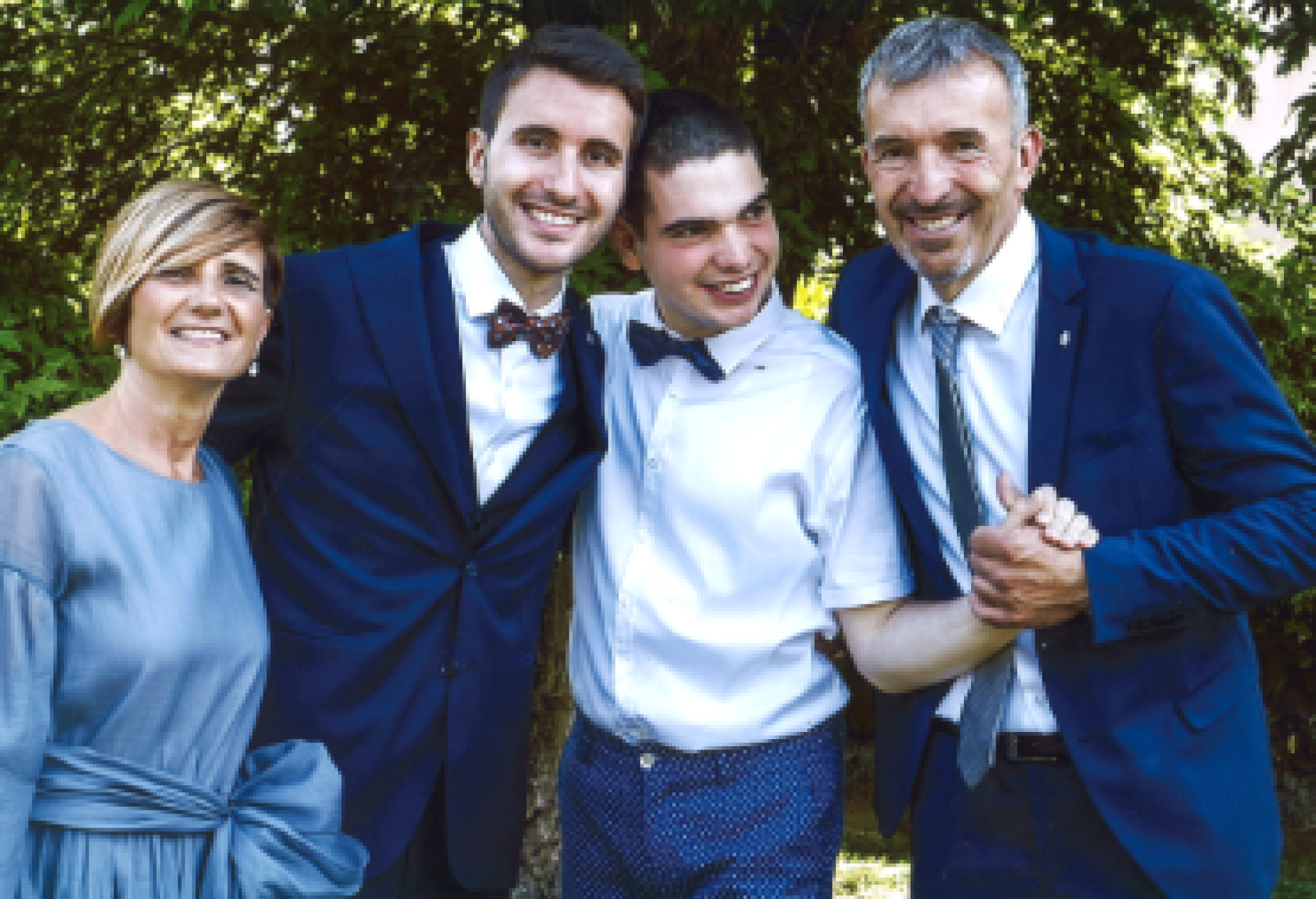 Alessandro, insieme ai genitori e al fratello Matteo