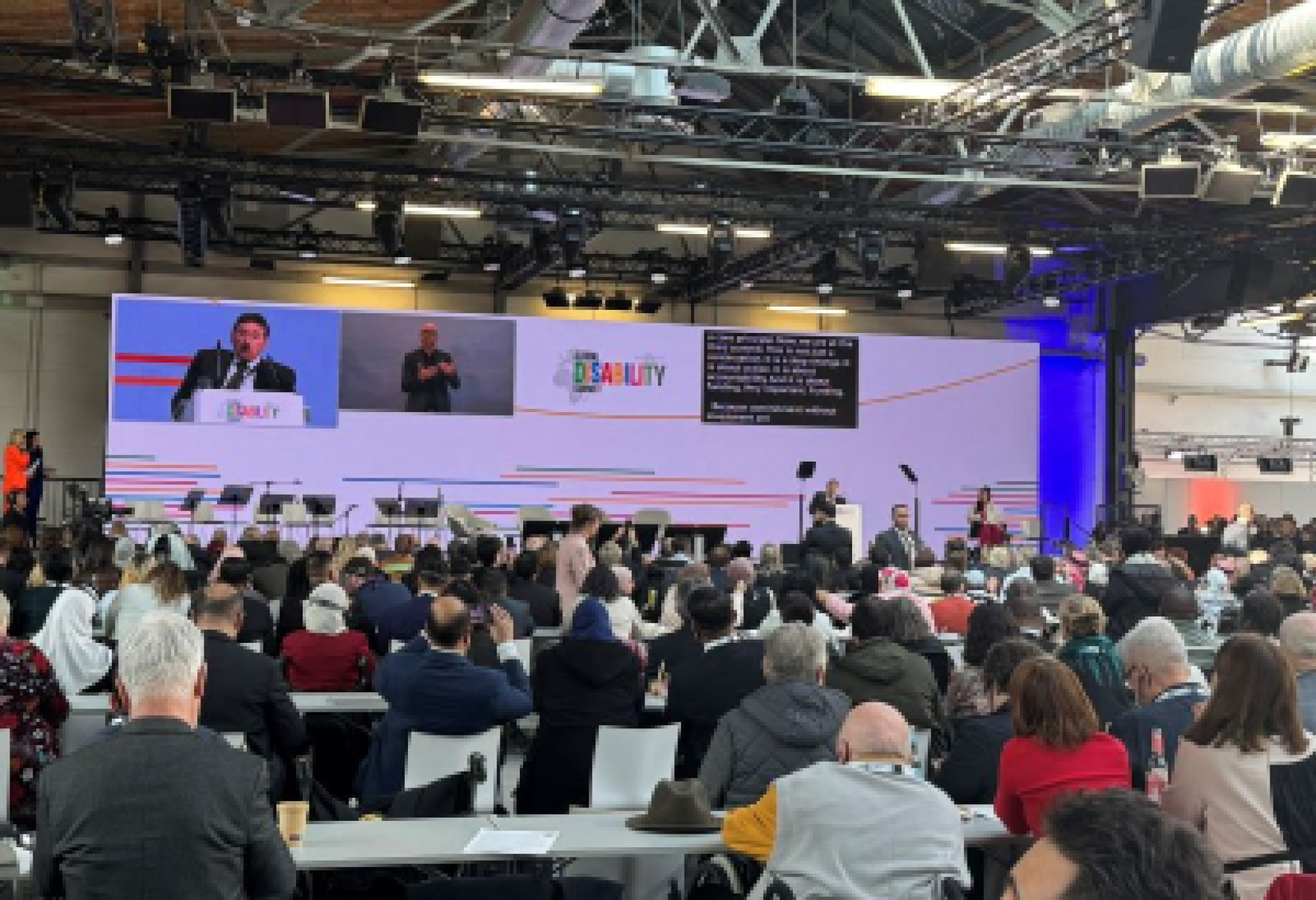 Un'immagine della giornata apertura del Global Disability Summit di Berlino, durante l'intervento di Nawaf Kabbara, presidente dell’IDA, l’Alleanza Internazionale sulla Disabilità