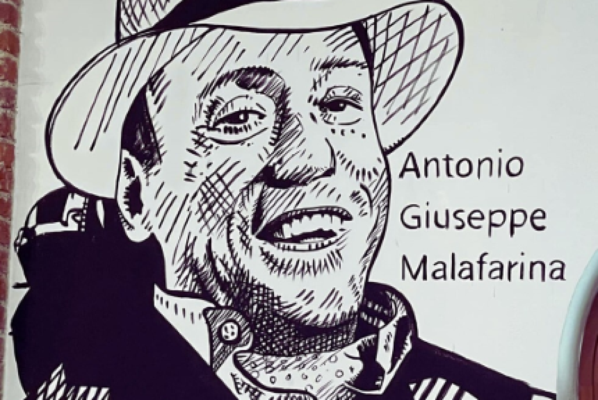 Il ritratto di Antonio Giuseppe Malarina realizzato dallo street artist Davide Ratzo, sulla Parete dei Giusti che si trova all’interno della Biblioteca Chiesa Rossa di Milano