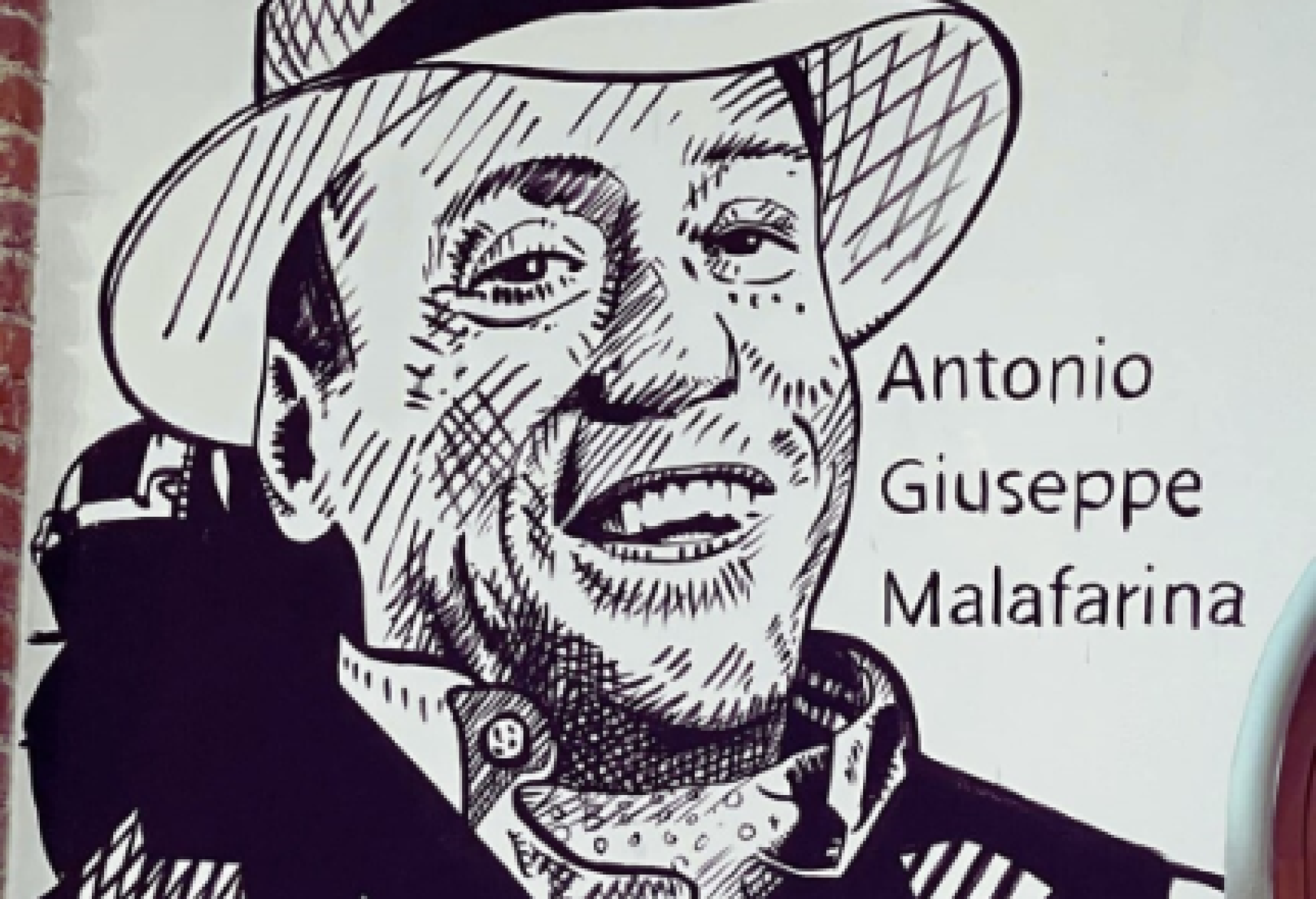 Il ritratto di Antonio Giuseppe Malarina realizzato dallo street artist Davide Ratzo, sulla Parete dei Giusti che si trova all’interno della Biblioteca Chiesa Rossa di Milano