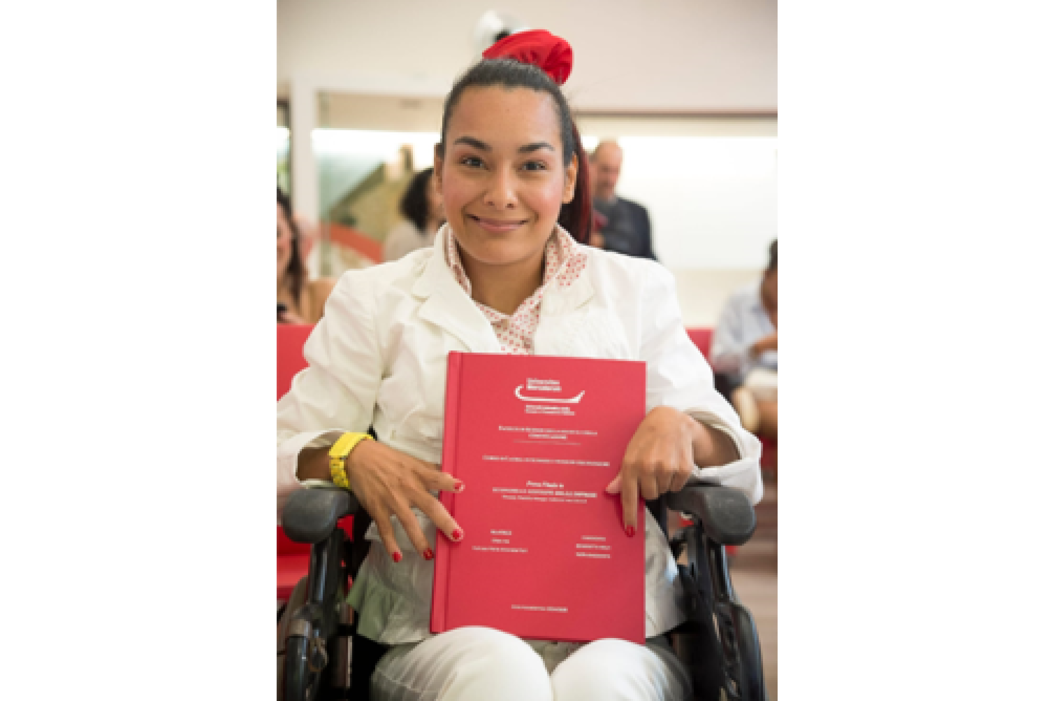 Benedetta Melfi con la sua tesi di laurea sul tema "Diversity Disability Manager. Analisi del caso O.R.A.S."