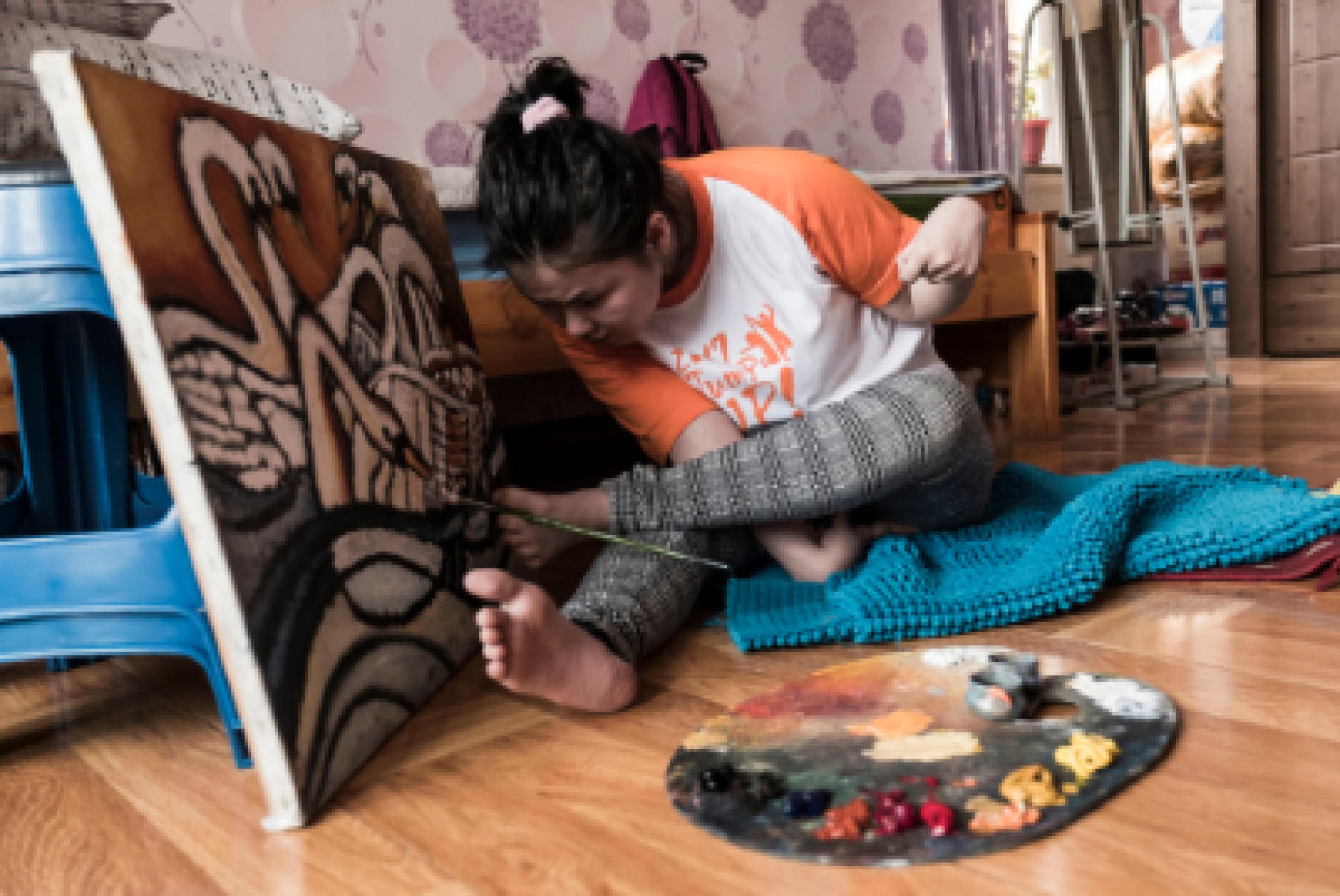 Una delle immagini della mostra "L'inclusione diventa vita", centrata su storie di persone con disabilità della Mongolia