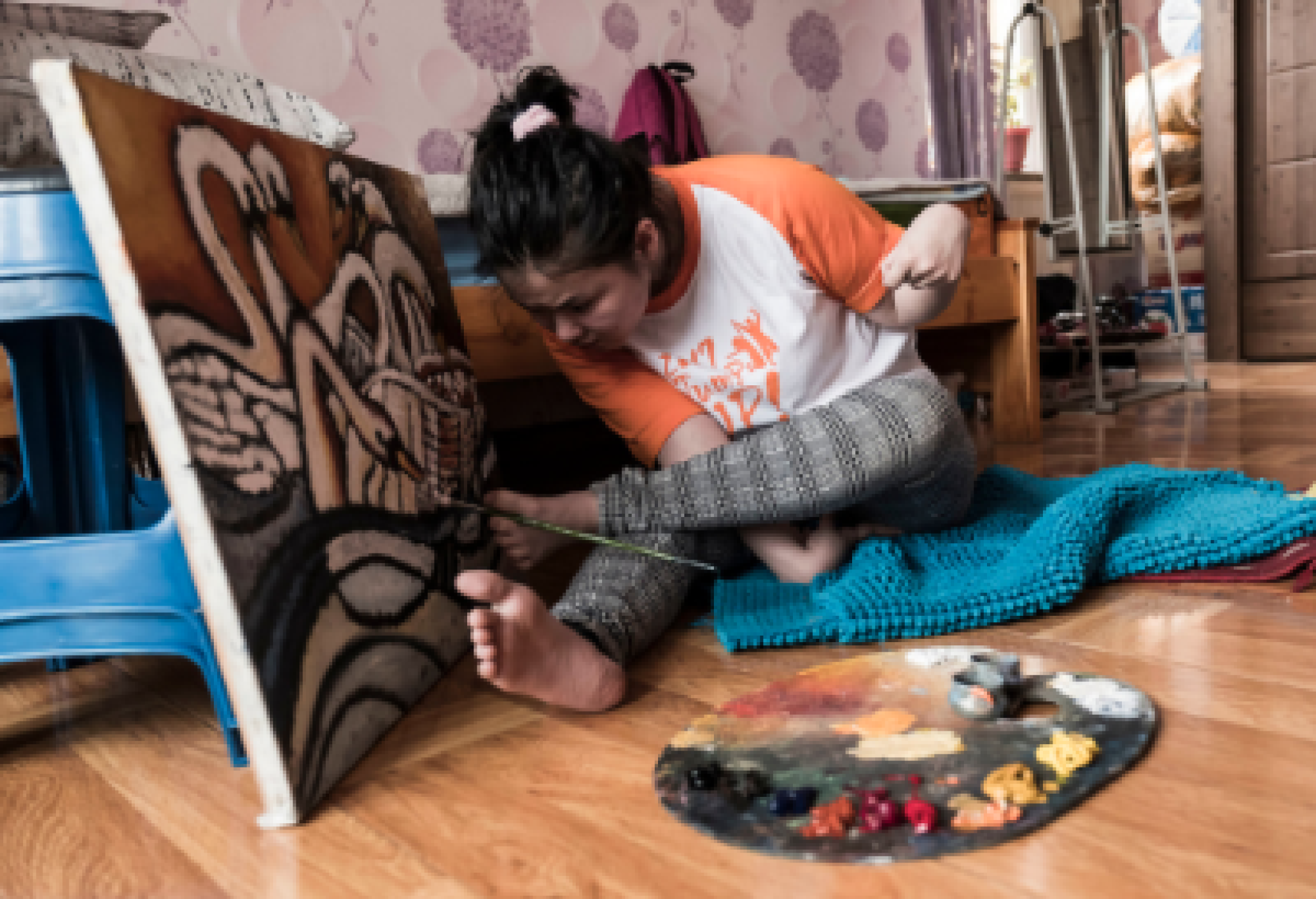 Una delle immagini della mostra "L'inclusione diventa vita", centrata su storie di persone con disabilità della Mongolia